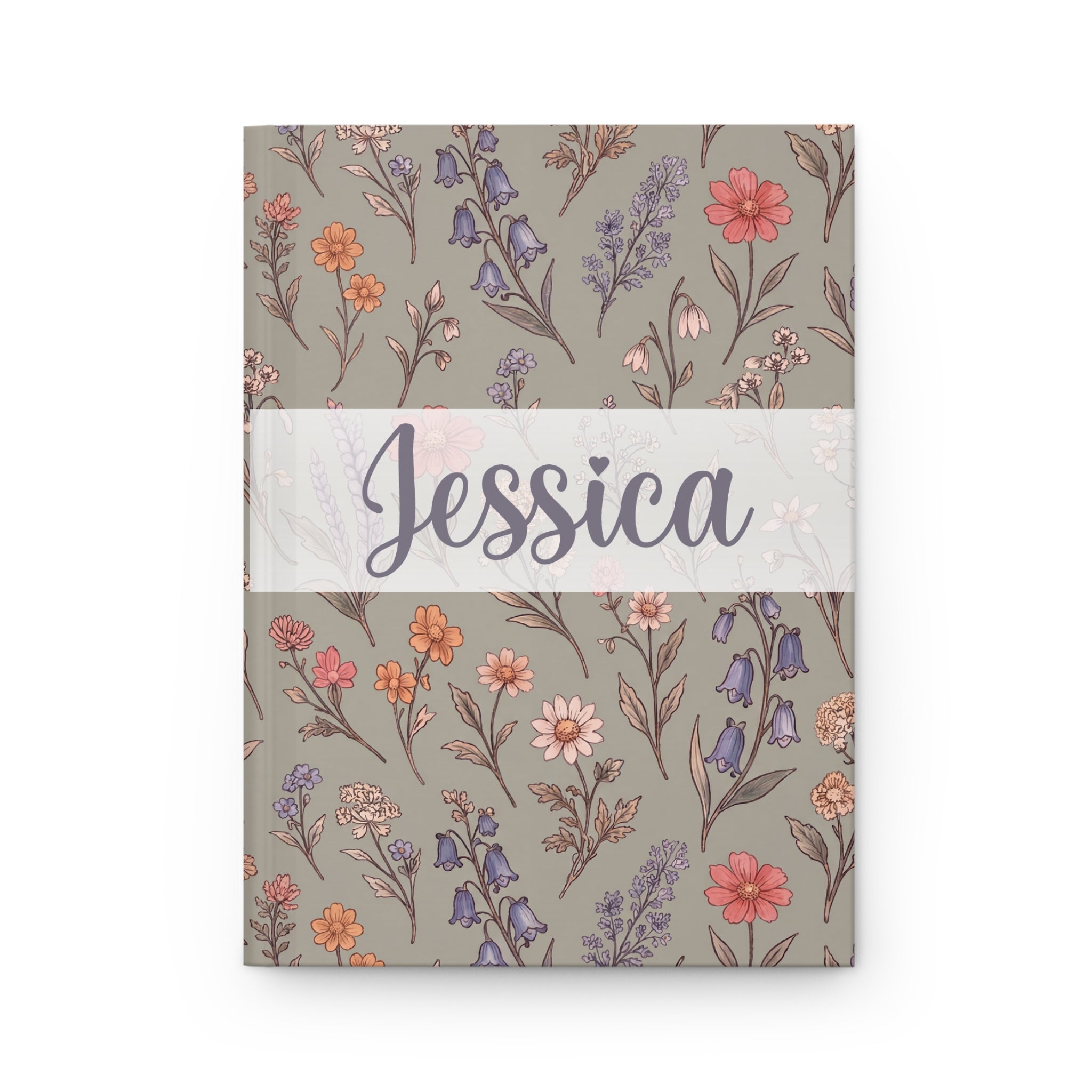 Notebook with floral pattern and 'Jessica' on a white background