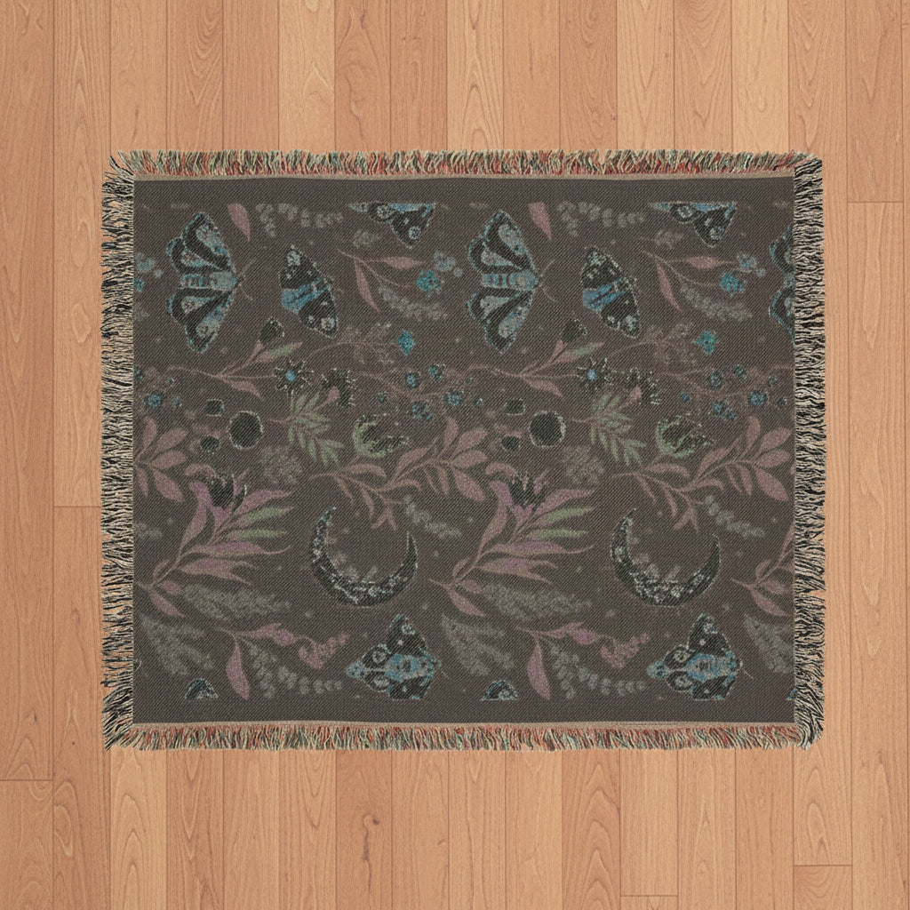Decorative blanket with butterfly pattern on a brown background