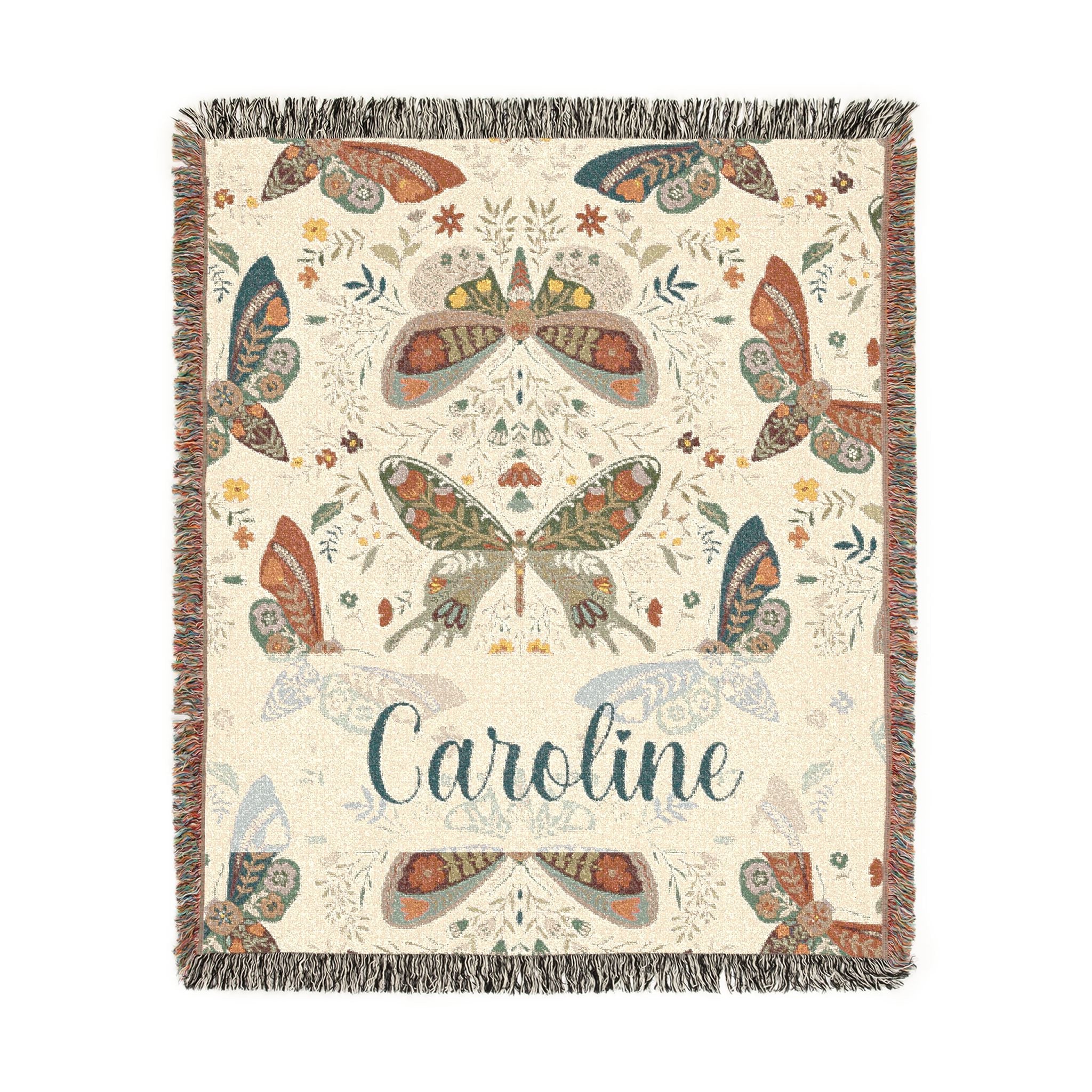 Decorative blanket with butterfly pattern and 'Caroline' text on a white background