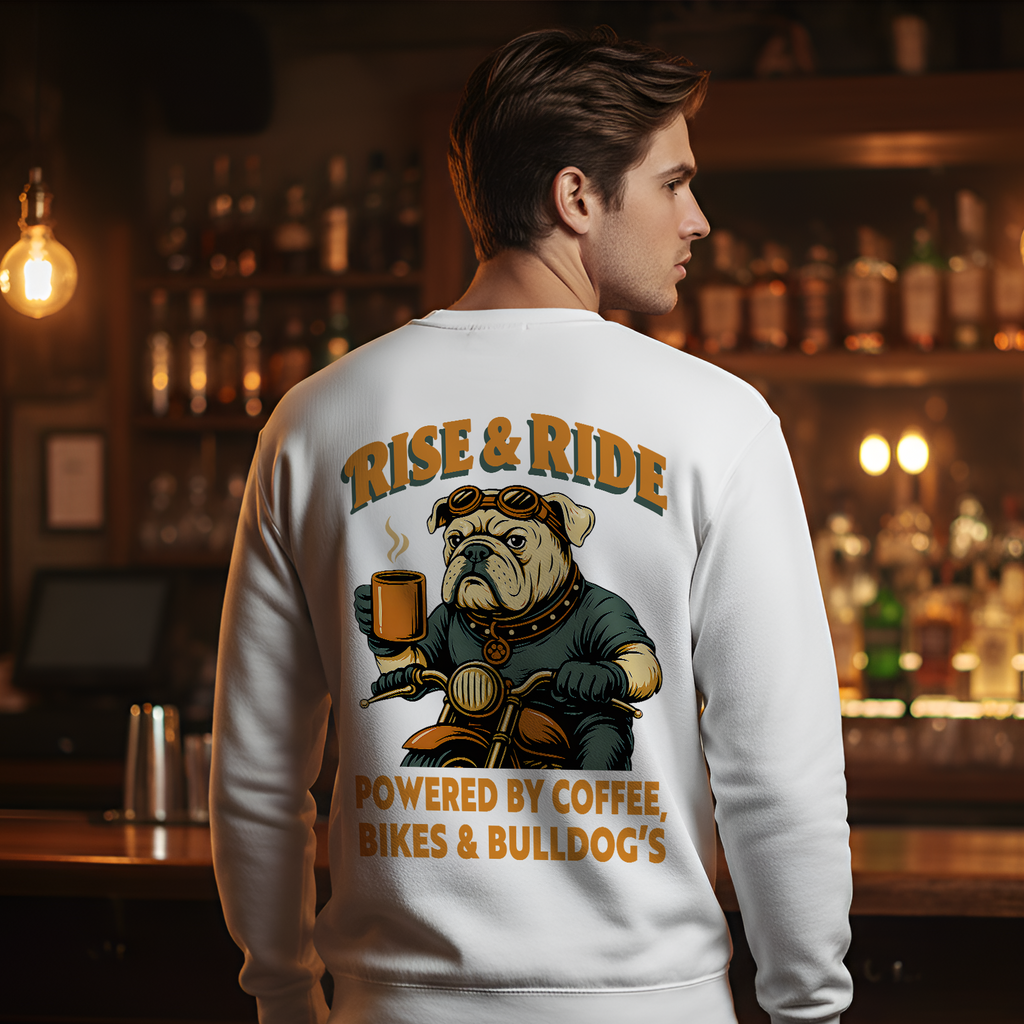 Person wearing a sweatshirt with a bulldog graphic and text in a bar setting