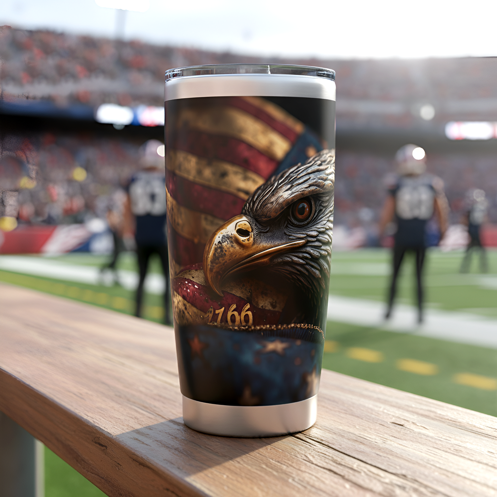 Tumbler with eagle design and American flag on a stadium background