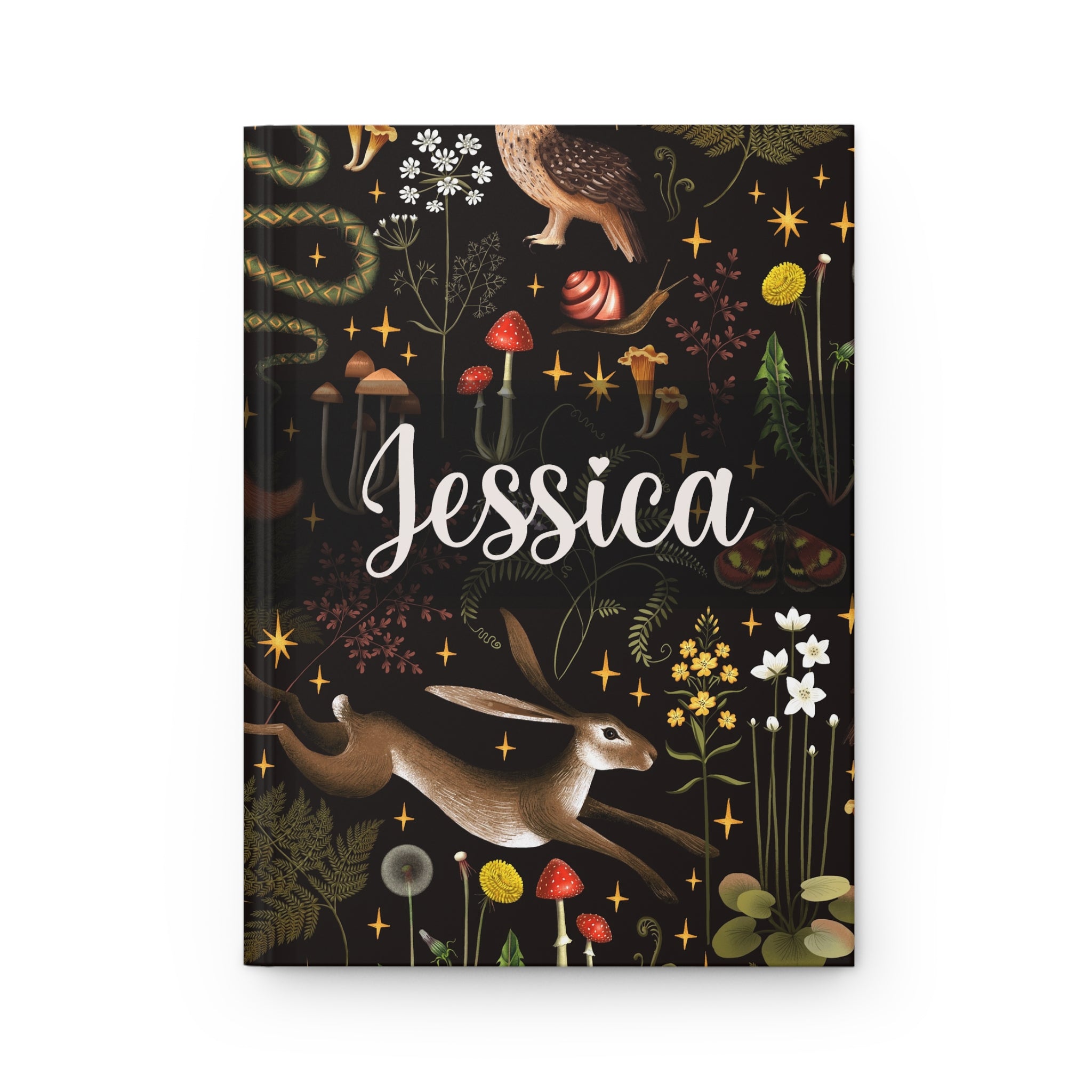 Notebook with a personalized name 'Jessica' on a dark cover featuring illustrations of animals and plants.