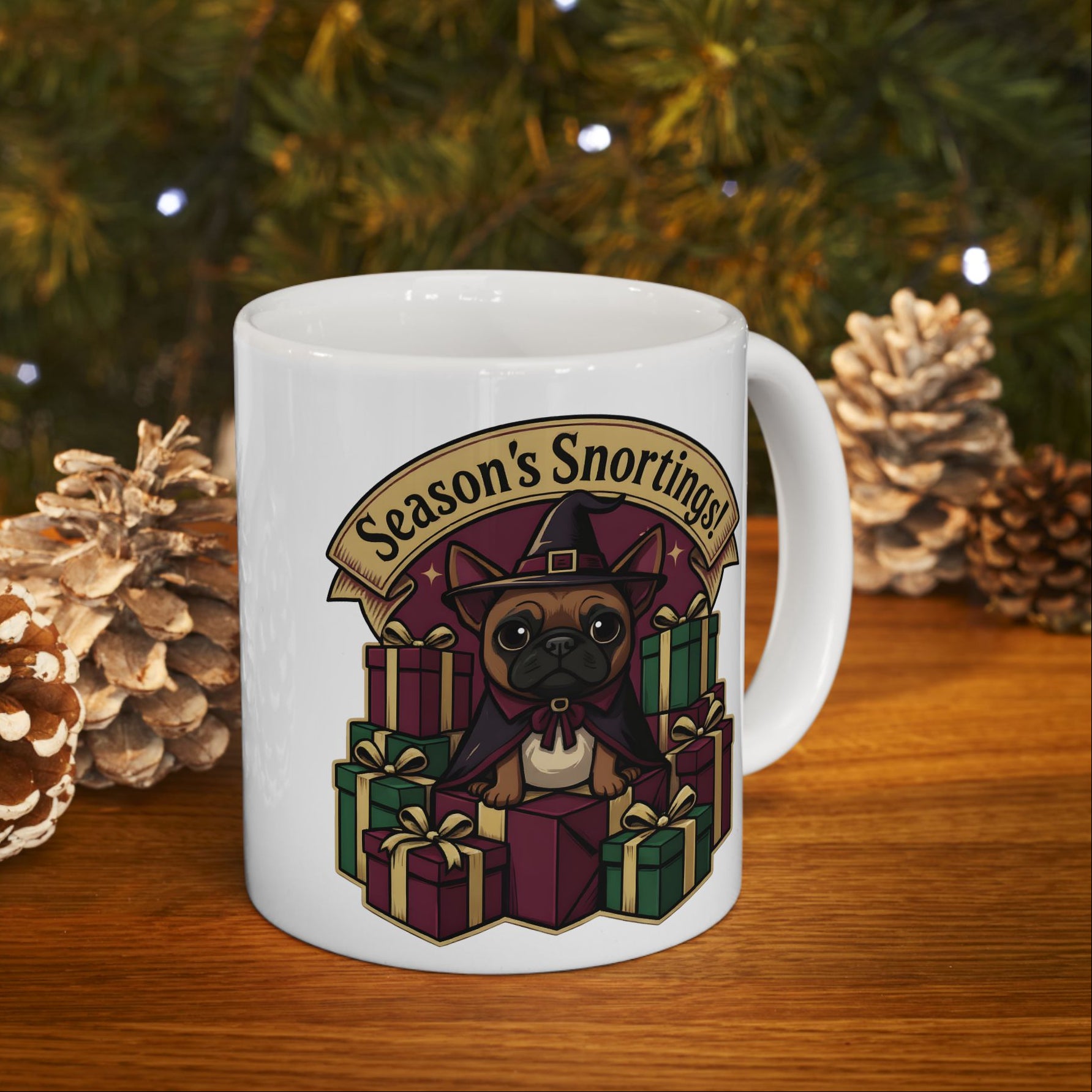 White mug with a dog and gift box design in front of a Christmas tree.