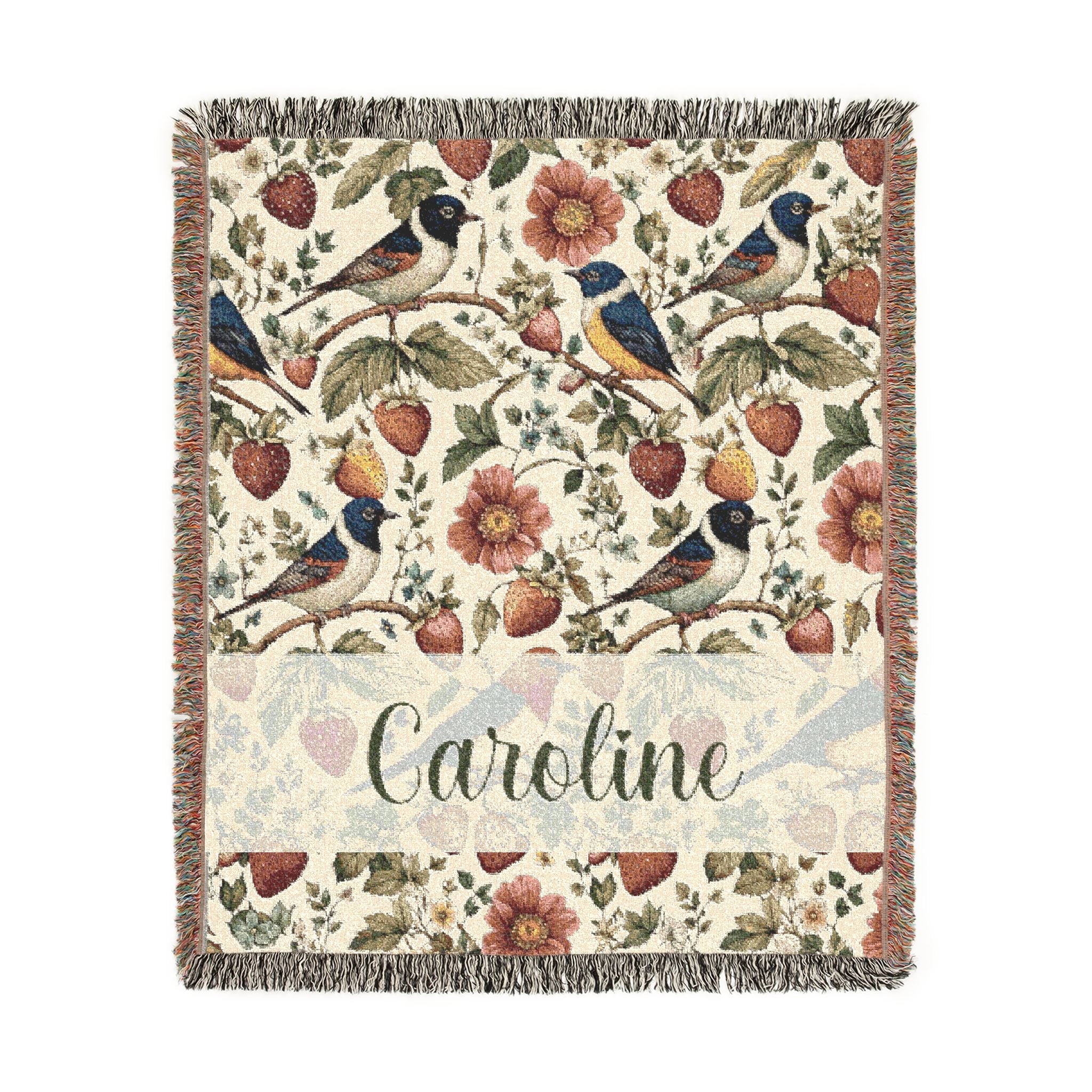 Floral and bird patterned throw blanket with 'Caroline' text on a white background