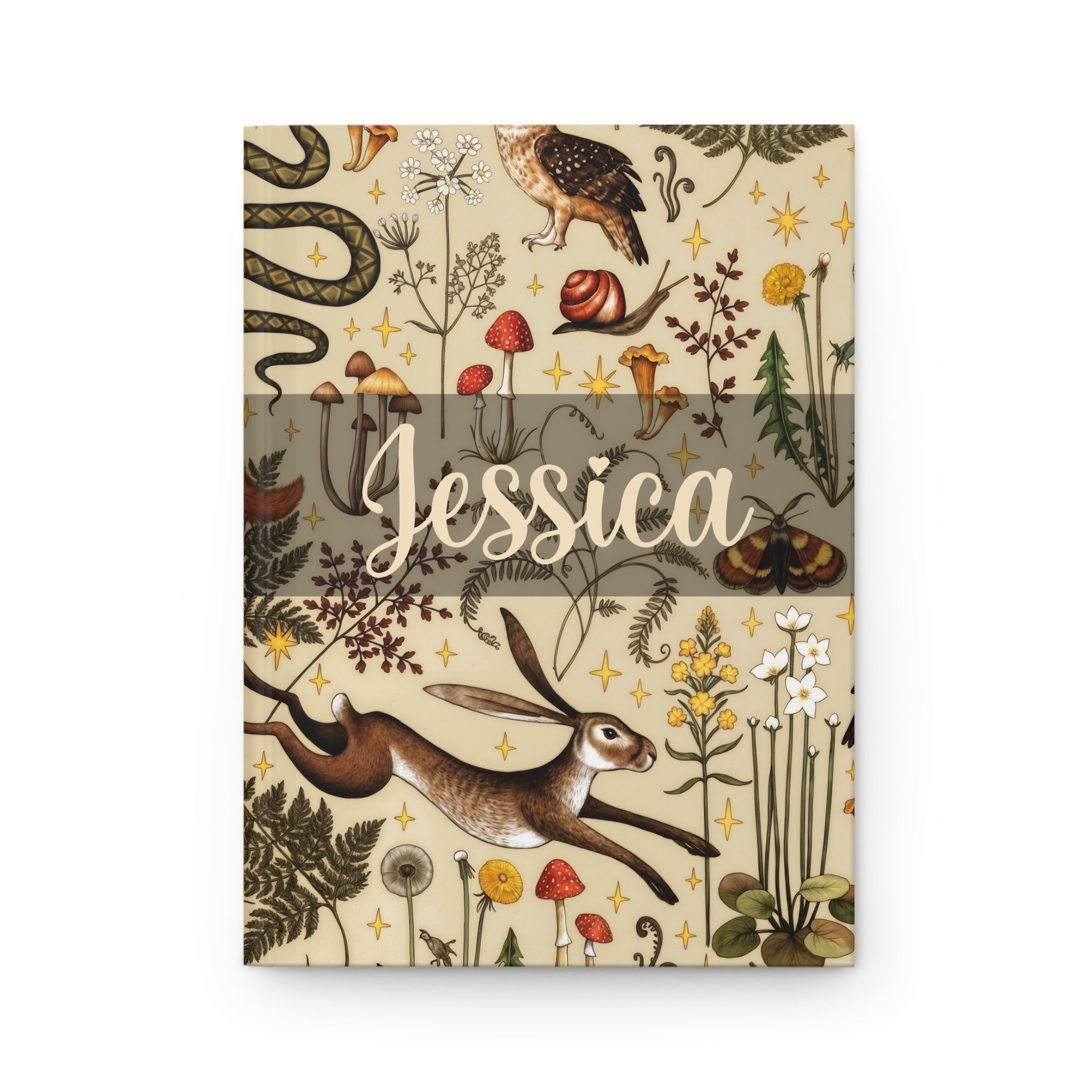Notebook cover with nature-themed design and the name 'Jessica' on a beige background