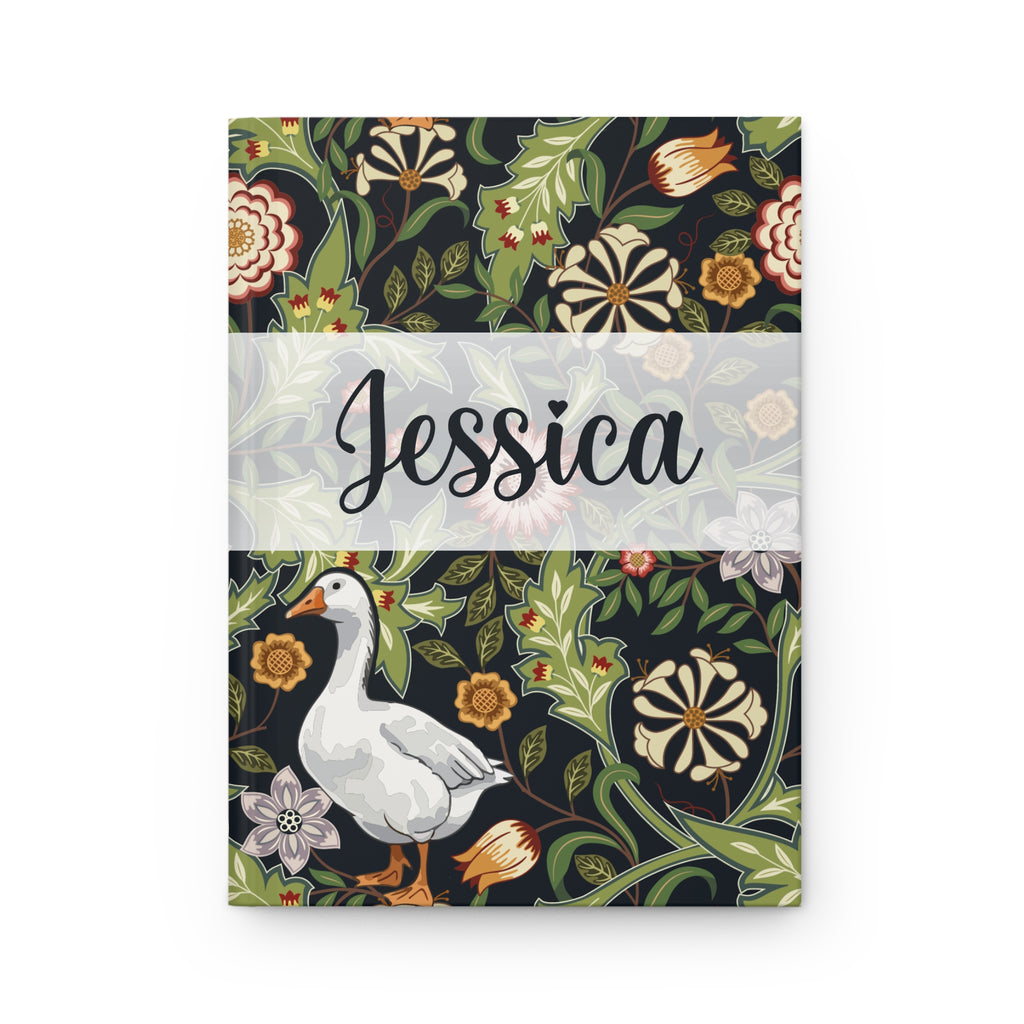 Notebook with floral design and goose illustration on a white background