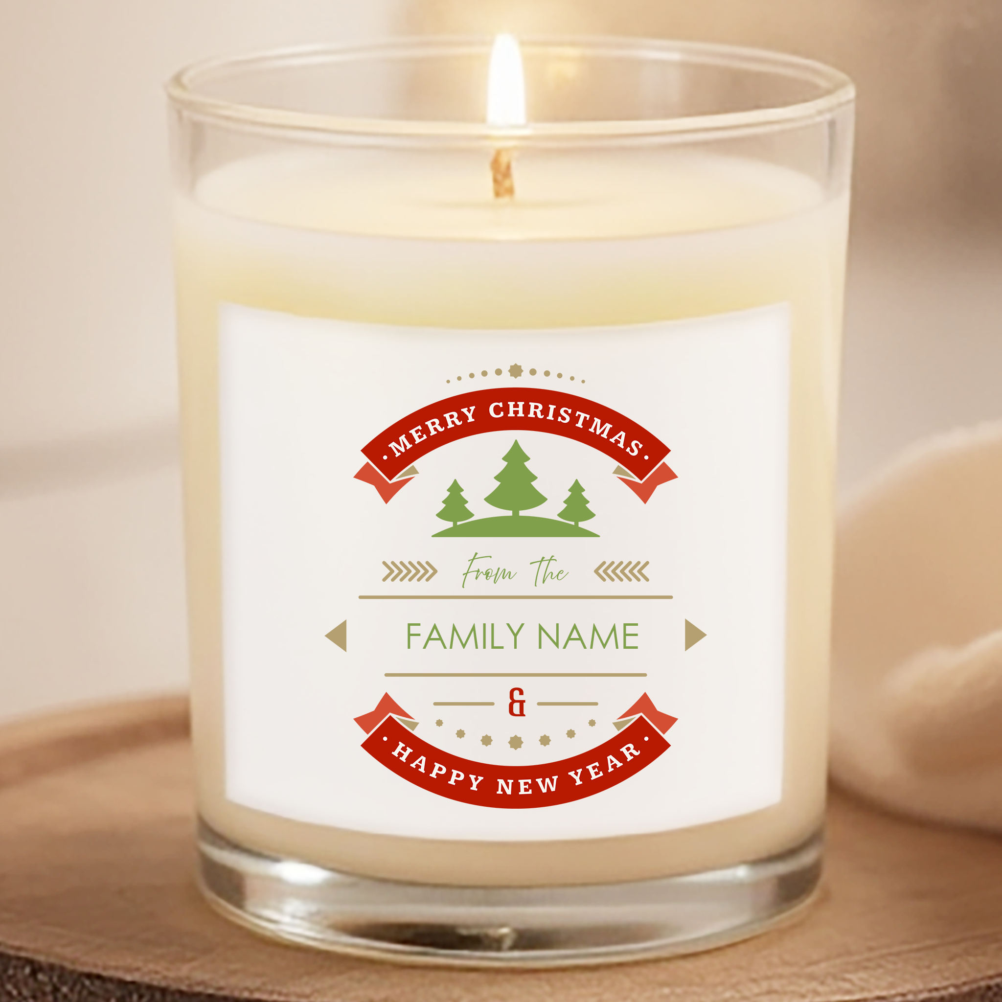Candle with a personalized Christmas label on a neutral background