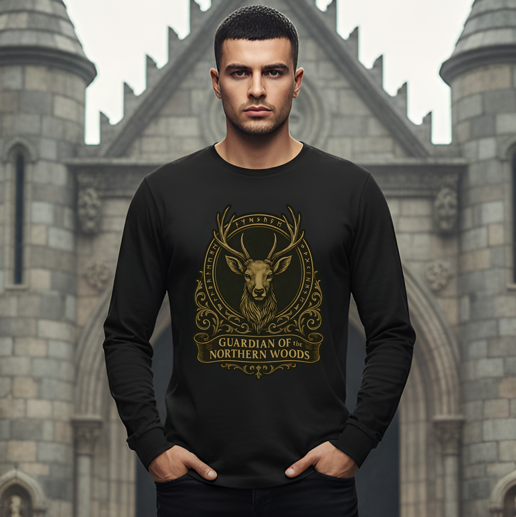Man wearing a black sweatshirt with a deer emblem in front of a castle-like structure