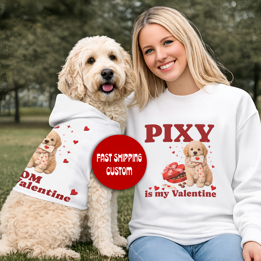Woman and dog wearing Valentine-themed shirts with a red circle label.