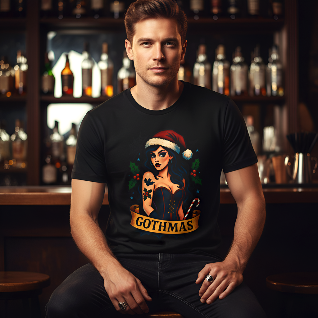 Man wearing a black t-shirt with 'Gothmas' design in a bar setting