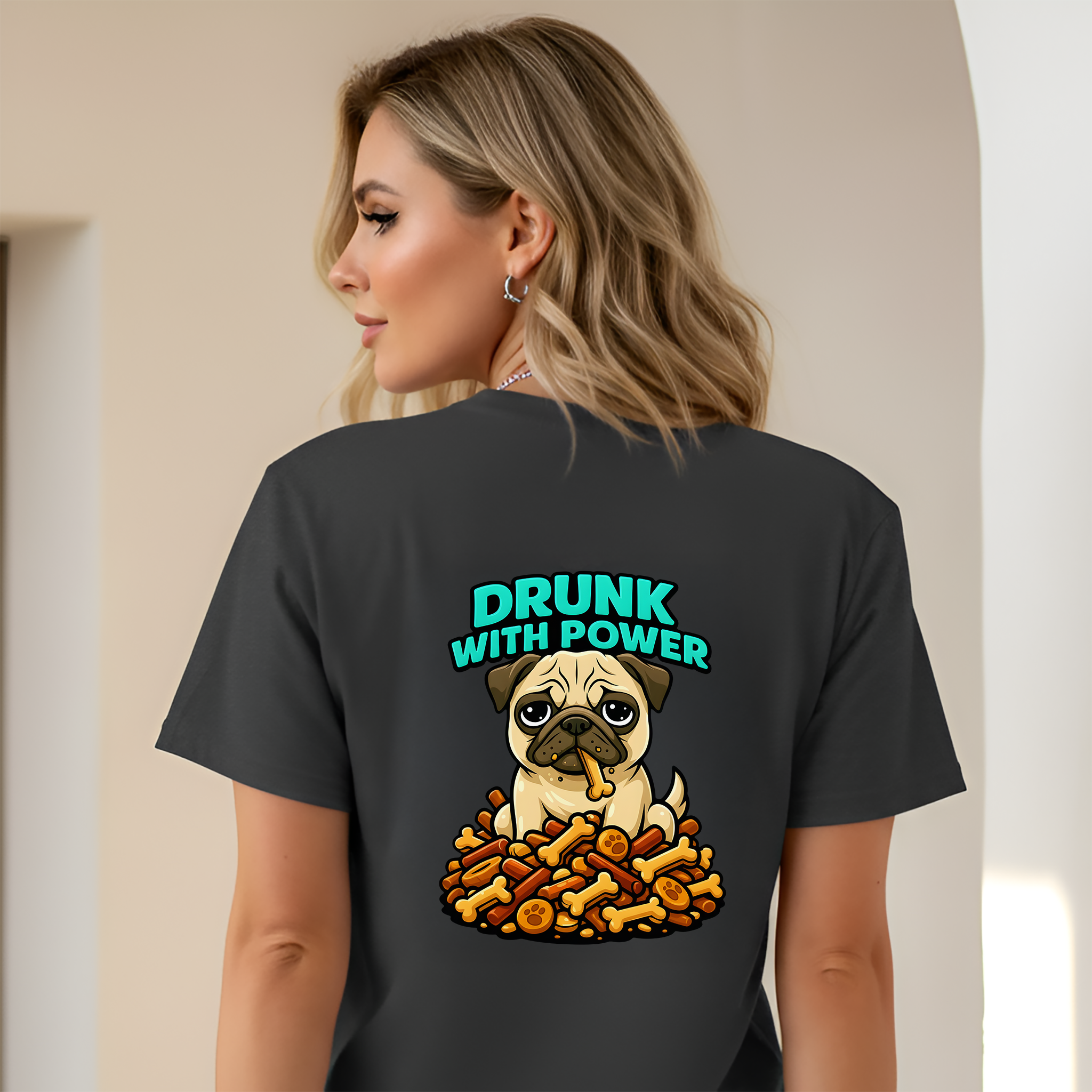 Person wearing a black t-shirt with a graphic of a pug and text 'Drunk with Power' on the back.