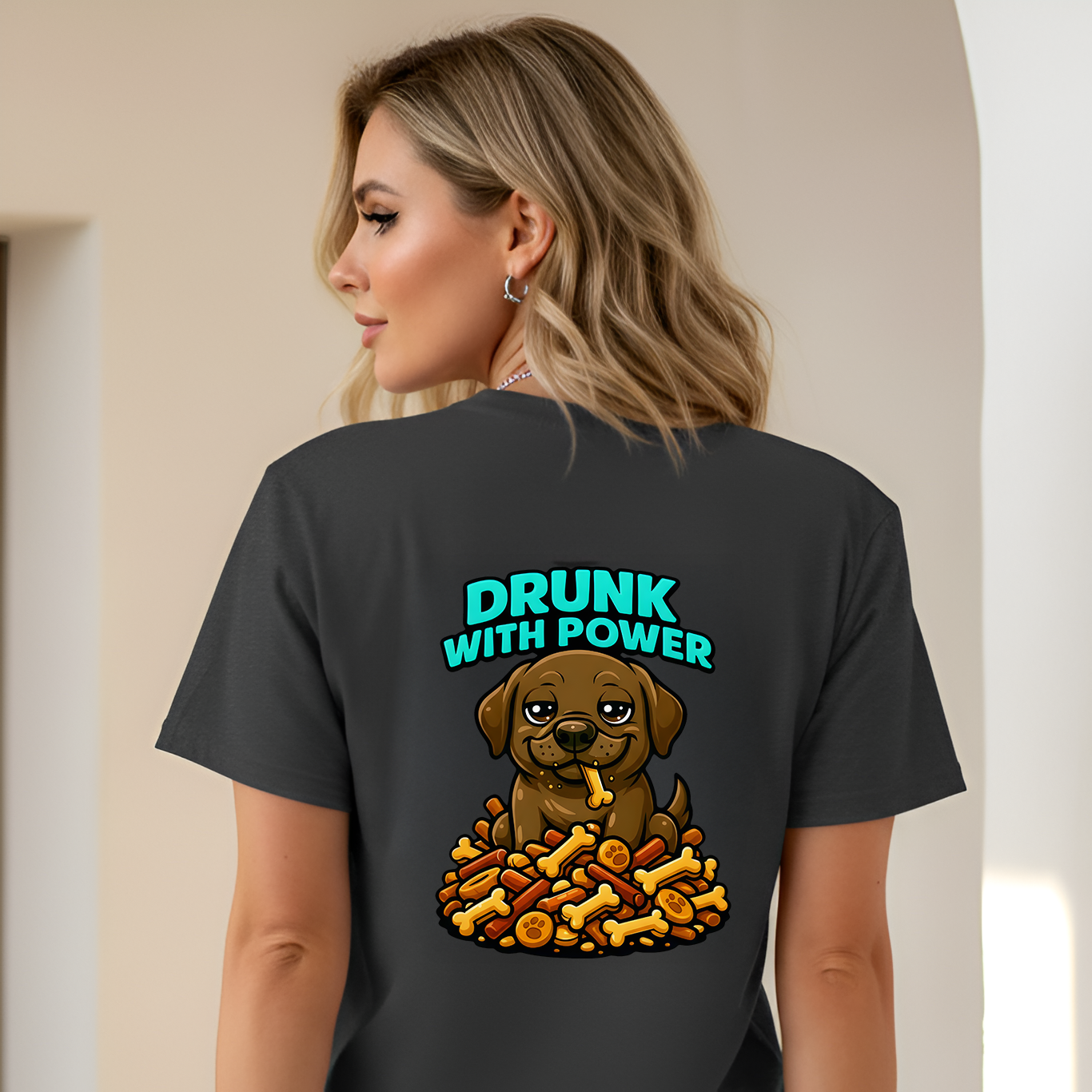 Person wearing a black t-shirt with a graphic of a dog and text 'Drunk with Power' on the back.
